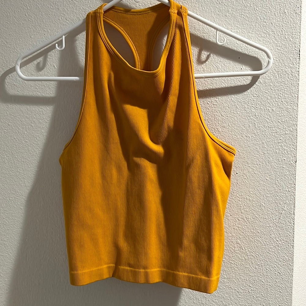 Brand new. Never worn. No tag. I expected to keep it.